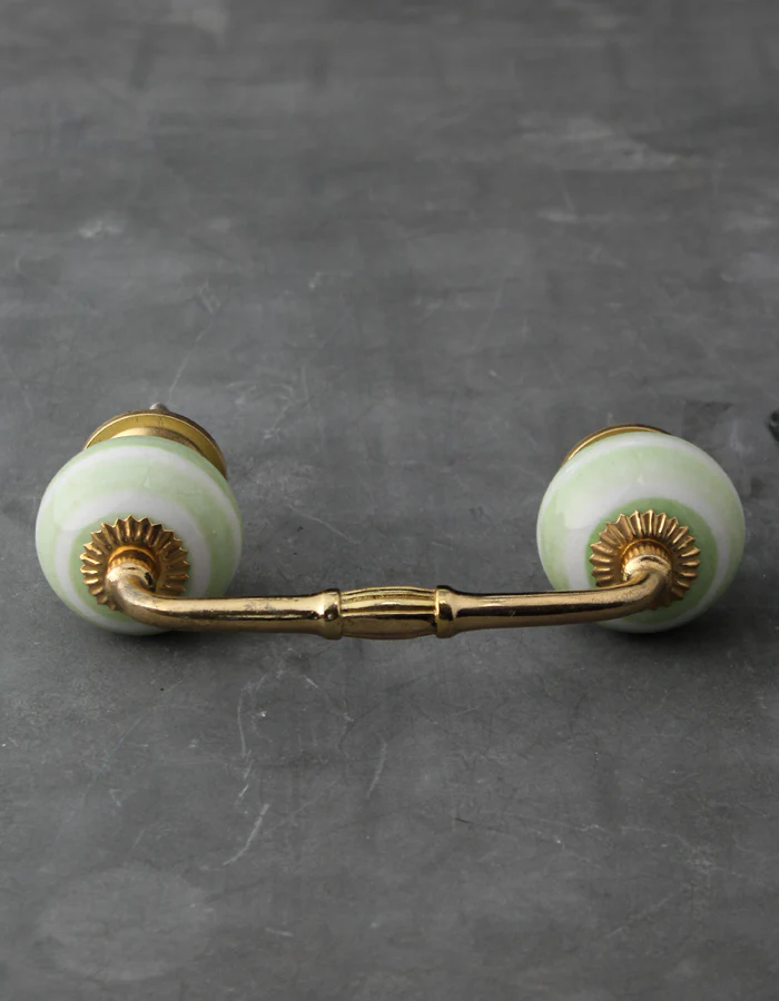 White Ceramic Kitchen Cabinet Pull With Lime Green Spiral Print - Image 3