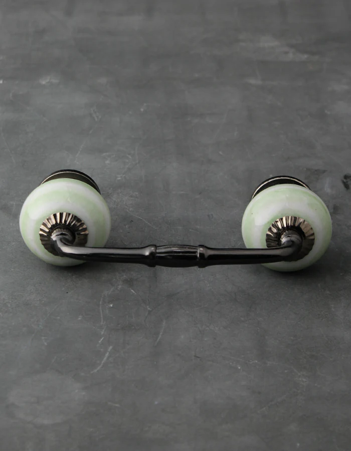 White Ceramic Kitchen Cabinet Pull With Lime Green Spiral Print - Image 4