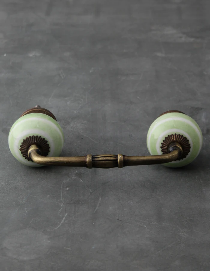 White Ceramic Kitchen Cabinet Pull With Lime Green Spiral Print - Image 6